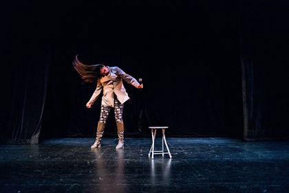 Lena Recollet, Manifest Destiny’s Child’s comedy troupe member, swings her hair wildly around as part of her performance.